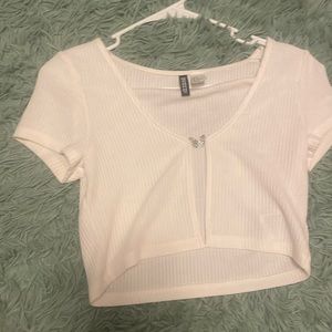 H&M white top with butterfly clasp